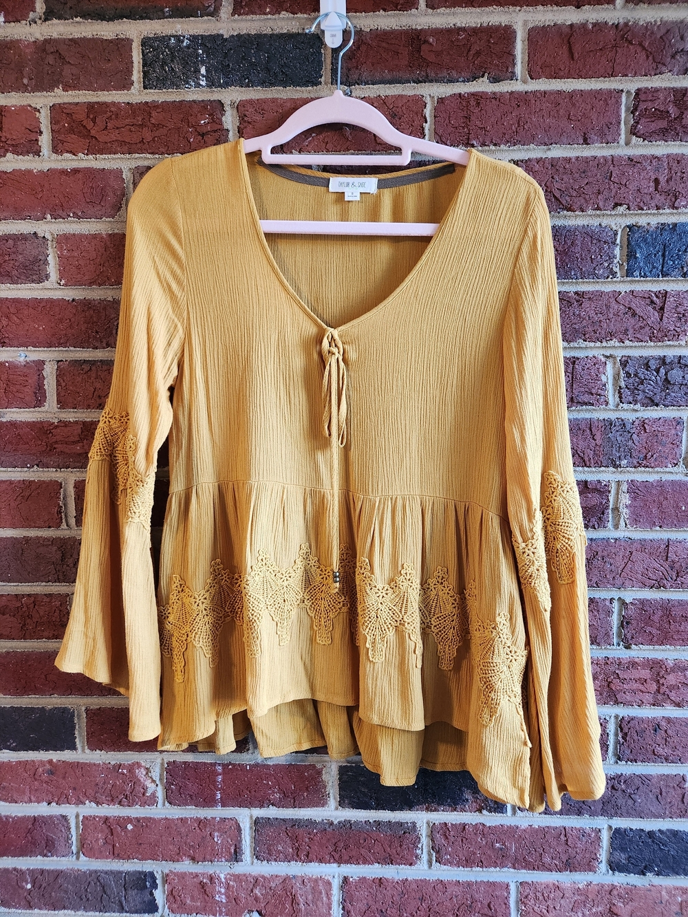 Taylor & Sage mustard yellow boho tunic featuring bell sleeves and crochet Trim